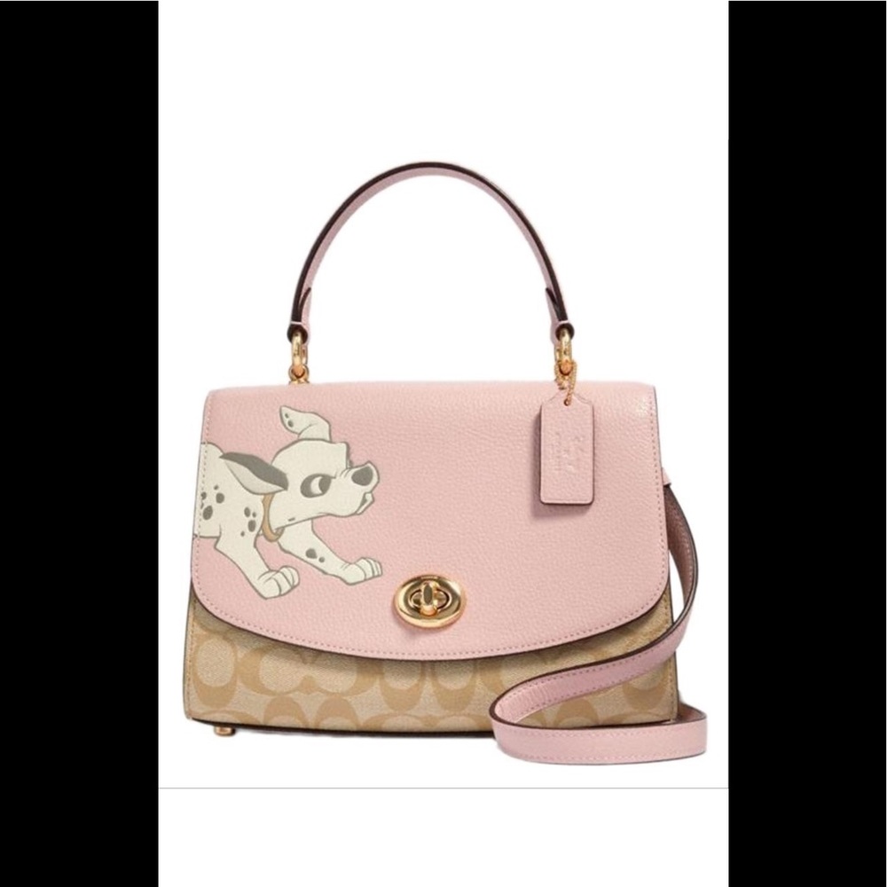 ***** SOLD****Disney DalmationXCoach Tilly
